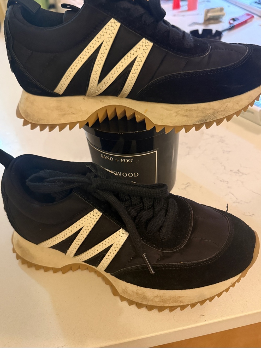 Moncler Pacey low top sneaker signature M pattern black and white luxury
